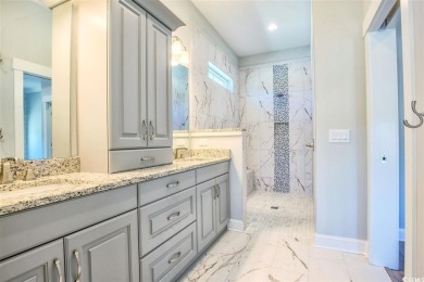 The Georgetown sits on Lot 49 in Living Dunes, a Grande Dunes on The Dunes Golf and Beach Club in South Carolina - for sale on GolfHomes.com, golf home, golf lot