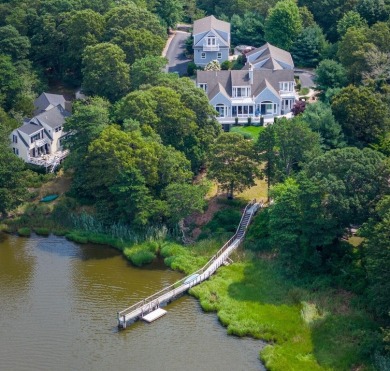 Discover a stunning waterfront property on Shoestring Bay in on Cotuit Highground Golf Course in Massachusetts - for sale on GolfHomes.com, golf home, golf lot