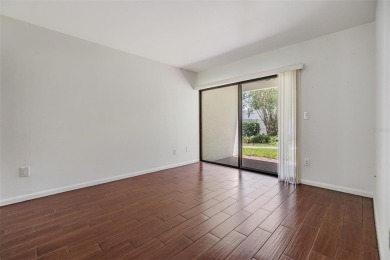 Welcome to this beautifully maintained 3-bedroom, 2-bathroom on Carrollwood Country Club in Florida - for sale on GolfHomes.com, golf home, golf lot