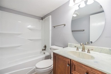 Welcome to this beautifully maintained 3-bedroom, 2-bathroom on Carrollwood Country Club in Florida - for sale on GolfHomes.com, golf home, golf lot