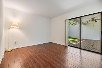 Welcome to this beautifully maintained 3-bedroom, 2-bathroom on Carrollwood Country Club in Florida - for sale on GolfHomes.com, golf home, golf lot