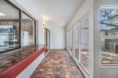 Welcome to this beautifully maintained 3-bedroom, 2-bathroom on Carrollwood Country Club in Florida - for sale on GolfHomes.com, golf home, golf lot