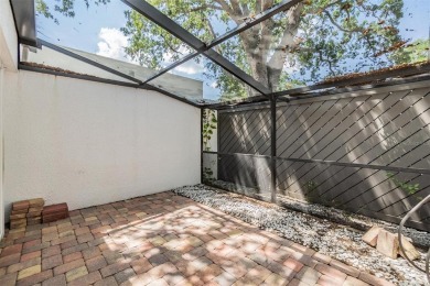 Welcome to this beautifully maintained 3-bedroom, 2-bathroom on Carrollwood Country Club in Florida - for sale on GolfHomes.com, golf home, golf lot