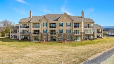 This beautifully updated, fully furnished one-level condo is on Rarity Bay Country Club - Loudon in Tennessee - for sale on GolfHomes.com, golf home, golf lot