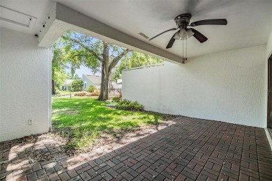 Welcome to this beautifully maintained 3-bedroom, 2-bathroom on Carrollwood Country Club in Florida - for sale on GolfHomes.com, golf home, golf lot