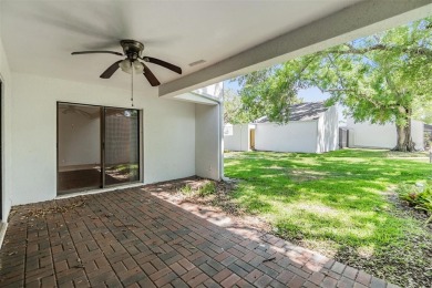 Welcome to this beautifully maintained 3-bedroom, 2-bathroom on Carrollwood Country Club in Florida - for sale on GolfHomes.com, golf home, golf lot