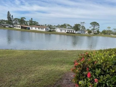 Stunning 2-Bedroom Home with Water Views - Lake Fairways    If on Lake Fairways Country Club in Florida - for sale on GolfHomes.com, golf home, golf lot