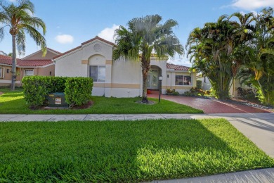 This stunning 3-bedroom, 2-bath waterfront home has it on Boca Raton Municipal Golf Course in Florida - for sale on GolfHomes.com, golf home, golf lot
