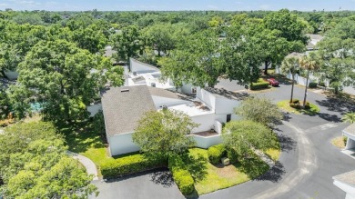 Welcome to this beautifully maintained 3-bedroom, 2-bathroom on Carrollwood Country Club in Florida - for sale on GolfHomes.com, golf home, golf lot
