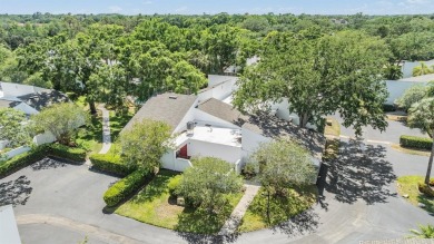 Welcome to this beautifully maintained 3-bedroom, 2-bathroom on Carrollwood Country Club in Florida - for sale on GolfHomes.com, golf home, golf lot