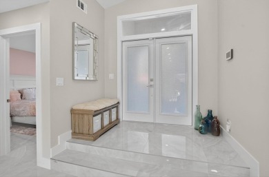 This stunning 3-bedroom, 2-bath waterfront home has it on Boca Raton Municipal Golf Course in Florida - for sale on GolfHomes.com, golf home, golf lot