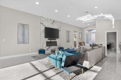 This stunning 3-bedroom, 2-bath waterfront home has it on Boca Raton Municipal Golf Course in Florida - for sale on GolfHomes.com, golf home, golf lot