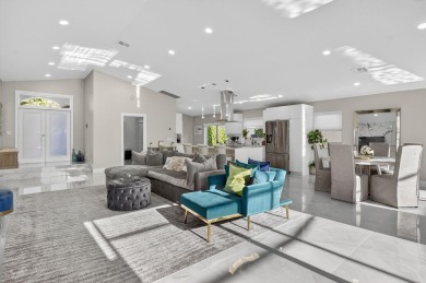 This stunning 3-bedroom, 2-bath waterfront home has it on Boca Raton Municipal Golf Course in Florida - for sale on GolfHomes.com, golf home, golf lot