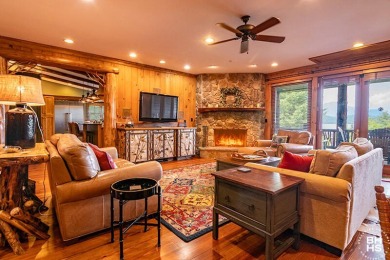 Discover unparalleled luxury in this stunning five-bedroom on Whiteface Club and Resort in New York - for sale on GolfHomes.com, golf home, golf lot