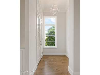 Charming 5-Bedroom Acadian-Style Home with Park Views in Sugar on Les Vieux Chenes Golf Course in Louisiana - for sale on GolfHomes.com, golf home, golf lot