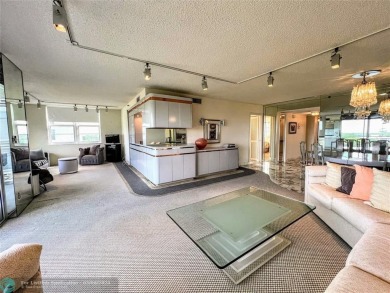 Located in the highly sought-after Palm Aire Country Club, this on Palm-Aire Country Club and Resort - Palms in Florida - for sale on GolfHomes.com, golf home, golf lot