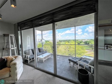 Located in the highly sought-after Palm Aire Country Club, this on Palm-Aire Country Club and Resort - Palms in Florida - for sale on GolfHomes.com, golf home, golf lot