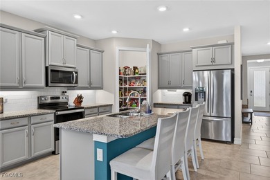 Welcome to your new home! The Delray Model, part of the highly on Herons Glen Golf and Country Club in Florida - for sale on GolfHomes.com, golf home, golf lot