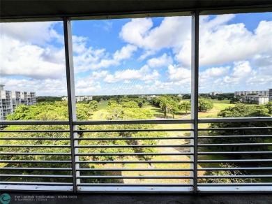 Located in the highly sought-after Palm Aire Country Club, this on Palm-Aire Country Club and Resort - Palms in Florida - for sale on GolfHomes.com, golf home, golf lot