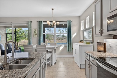 Welcome to your new home! The Delray Model, part of the highly on Herons Glen Golf and Country Club in Florida - for sale on GolfHomes.com, golf home, golf lot