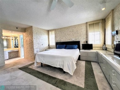 Located in the highly sought-after Palm Aire Country Club, this on Palm-Aire Country Club and Resort - Palms in Florida - for sale on GolfHomes.com, golf home, golf lot