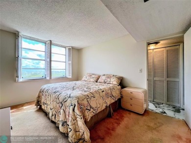 Located in the highly sought-after Palm Aire Country Club, this on Palm-Aire Country Club and Resort - Palms in Florida - for sale on GolfHomes.com, golf home, golf lot