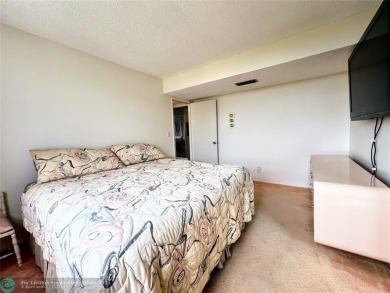 Located in the highly sought-after Palm Aire Country Club, this on Palm-Aire Country Club and Resort - Palms in Florida - for sale on GolfHomes.com, golf home, golf lot