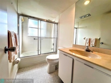 Located in the highly sought-after Palm Aire Country Club, this on Palm-Aire Country Club and Resort - Palms in Florida - for sale on GolfHomes.com, golf home, golf lot