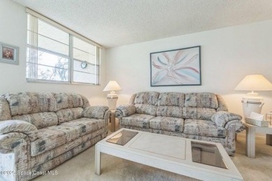 Wake up to lake and golf course views from this bright and on  in Florida - for sale on GolfHomes.com, golf home, golf lot