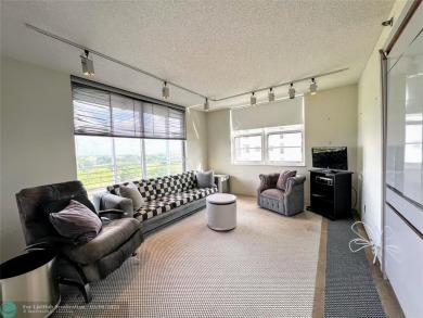 Located in the highly sought-after Palm Aire Country Club, this on Palm-Aire Country Club and Resort - Palms in Florida - for sale on GolfHomes.com, golf home, golf lot