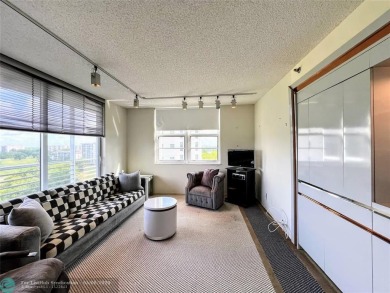 Located in the highly sought-after Palm Aire Country Club, this on Palm-Aire Country Club and Resort - Palms in Florida - for sale on GolfHomes.com, golf home, golf lot