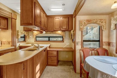 Beautifully maintained 2007 DoubleTree Select Suite camper - on River Ridge Golf Club in Virginia - for sale on GolfHomes.com, golf home, golf lot