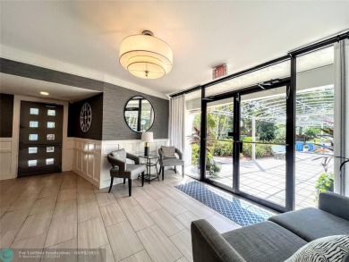 Located in the highly sought-after Palm Aire Country Club, this on Palm-Aire Country Club and Resort - Palms in Florida - for sale on GolfHomes.com, golf home, golf lot
