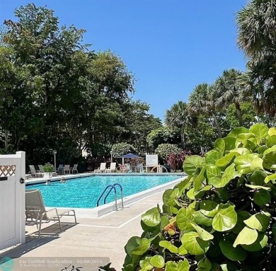 Located in the highly sought-after Palm Aire Country Club, this on Palm-Aire Country Club and Resort - Palms in Florida - for sale on GolfHomes.com, golf home, golf lot