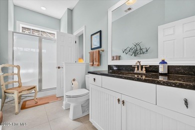 Welcome to your all-brick coastal retreat in the prestigious on Ocean Ridge Plantation in North Carolina - for sale on GolfHomes.com, golf home, golf lot