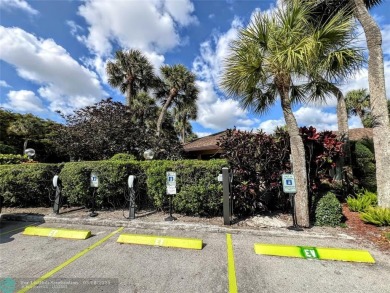 Located in the highly sought-after Palm Aire Country Club, this on Palm-Aire Country Club and Resort - Palms in Florida - for sale on GolfHomes.com, golf home, golf lot