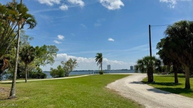 Pack your bags!  This large, corner lot, 2 bedroom & 2 bathroom on Riverbend Golf and Country Club in Florida - for sale on GolfHomes.com, golf home, golf lot