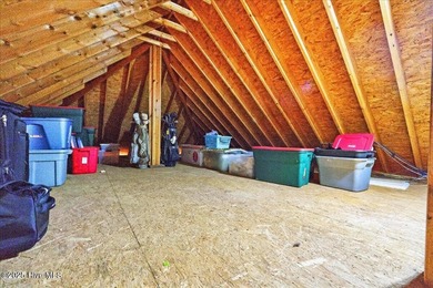 Welcome to your all-brick coastal retreat in the prestigious on Ocean Ridge Plantation in North Carolina - for sale on GolfHomes.com, golf home, golf lot