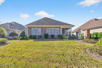 Welcome to your all-brick coastal retreat in the prestigious on Ocean Ridge Plantation in North Carolina - for sale on GolfHomes.com, golf home, golf lot