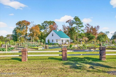 Welcome to your all-brick coastal retreat in the prestigious on Ocean Ridge Plantation in North Carolina - for sale on GolfHomes.com, golf home, golf lot