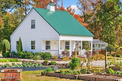 Welcome to your all-brick coastal retreat in the prestigious on Ocean Ridge Plantation in North Carolina - for sale on GolfHomes.com, golf home, golf lot