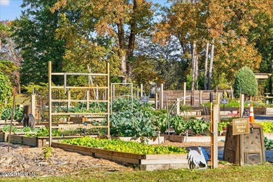 Welcome to your all-brick coastal retreat in the prestigious on Ocean Ridge Plantation in North Carolina - for sale on GolfHomes.com, golf home, golf lot