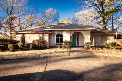 This stucco-built home is hitting the market! Featuring 4 on El Dorado Golf and Country Club in Arkansas - for sale on GolfHomes.com, golf home, golf lot