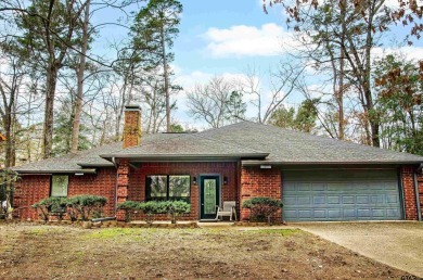 Don't miss out on this stunning home! Nestled in the welcoming on Holly Lake Ranch Golf Club in Texas - for sale on GolfHomes.com, golf home, golf lot