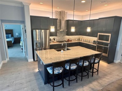 Welcome to this absolutely stunning CUSTOM DESIGNER home where on Pennbrooke Fairways in Florida - for sale on GolfHomes.com, golf home, golf lot