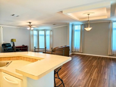 A RARE OPPORTUNITY TO FIND THIS MODEL AT THIS PRICE.  OWNERS ARE on Southport Springs Golf Club in Florida - for sale on GolfHomes.com, golf home, golf lot