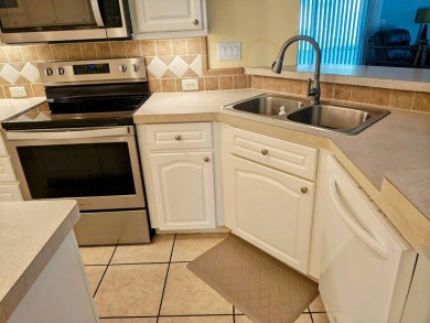 A RARE OPPORTUNITY TO FIND THIS MODEL AT THIS PRICE.  OWNERS ARE on Southport Springs Golf Club in Florida - for sale on GolfHomes.com, golf home, golf lot