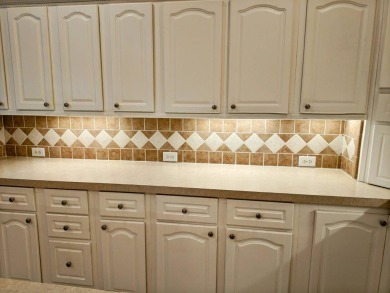 A RARE OPPORTUNITY TO FIND THIS MODEL AT THIS PRICE.  OWNERS ARE on Southport Springs Golf Club in Florida - for sale on GolfHomes.com, golf home, golf lot