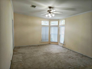 A RARE OPPORTUNITY TO FIND THIS MODEL AT THIS PRICE.  OWNERS ARE on Southport Springs Golf Club in Florida - for sale on GolfHomes.com, golf home, golf lot