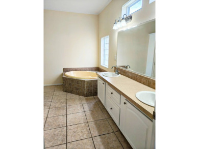 A RARE OPPORTUNITY TO FIND THIS MODEL AT THIS PRICE.  OWNERS ARE on Southport Springs Golf Club in Florida - for sale on GolfHomes.com, golf home, golf lot